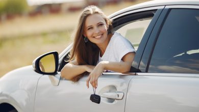 Happy Women In A Rental Car