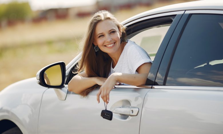 Happy Women In A Rental Car